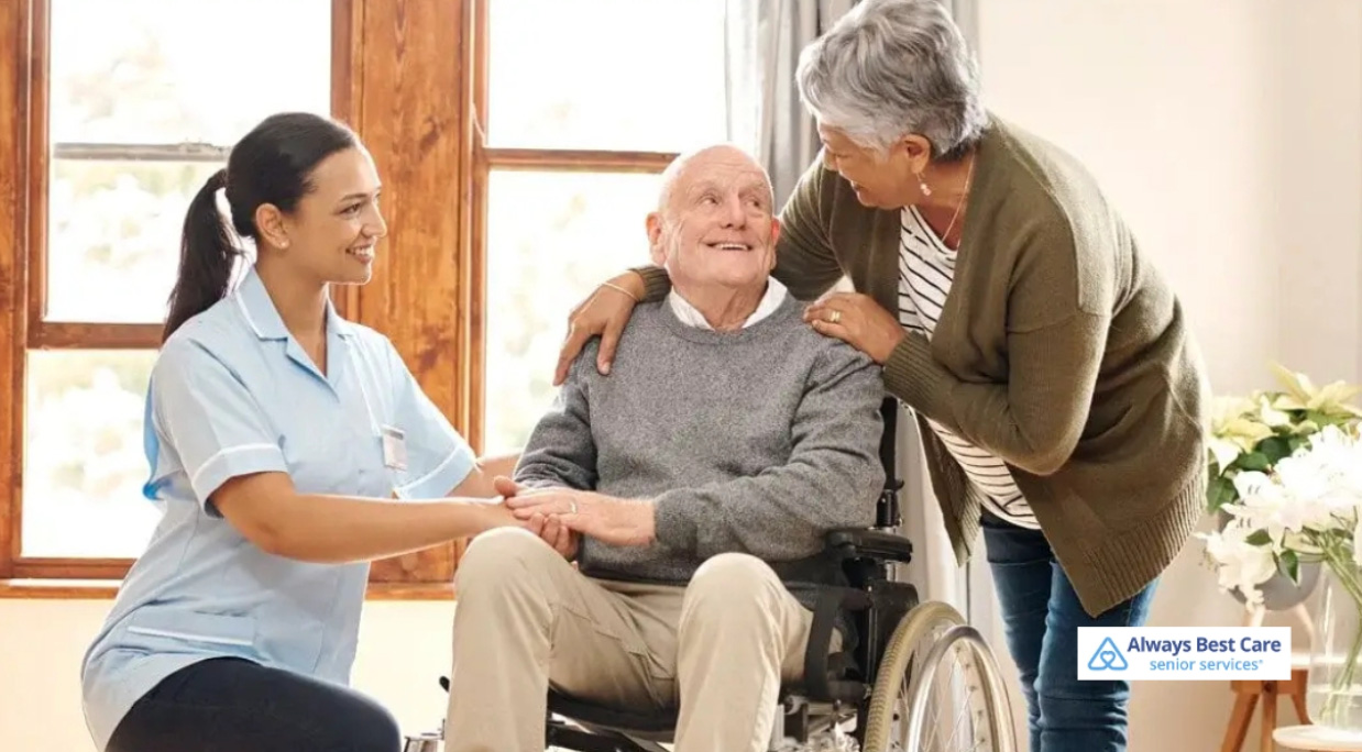 caregiver with senior man in wheelchair