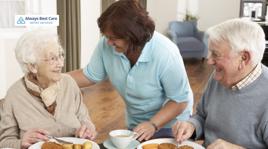 * Friendly caregiver chats with a senior couple during lunch, highlighting positive caregiver relationships and daily support.
Image 8 (Unhappy senior with poor meal)